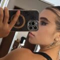 Campioana Valentina Cambei, apariție provocatoare cu tatuajele de pe abdomen şi de pe coapsă la vedere